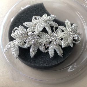 real silver hair clip with real crystals.